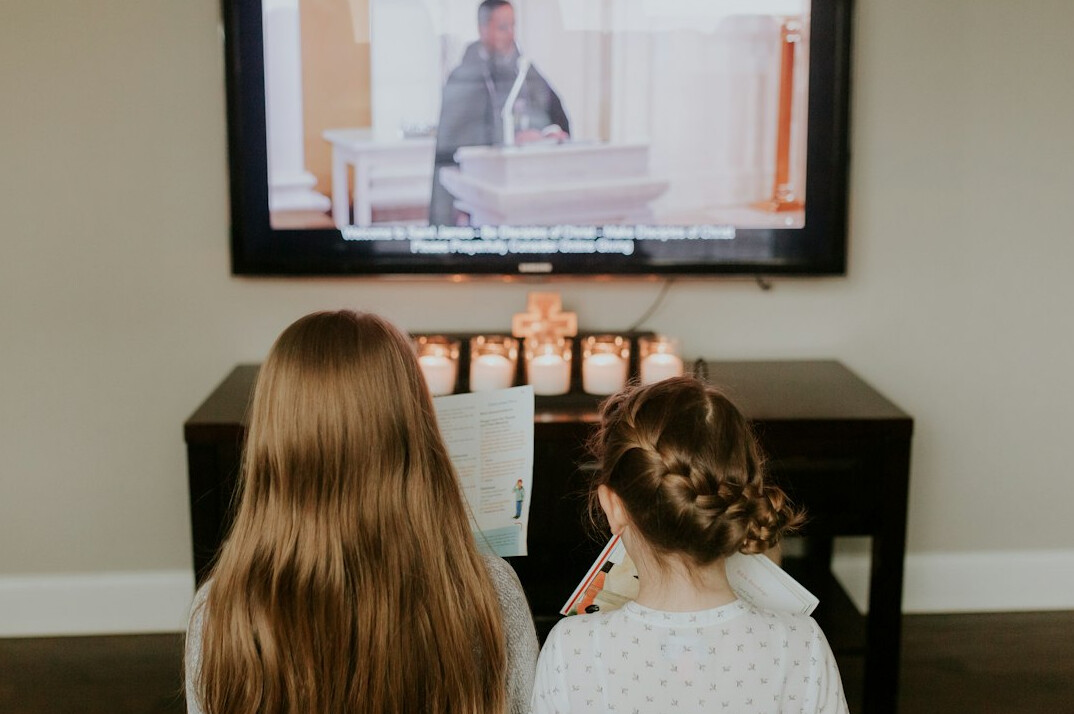 family watching old tv