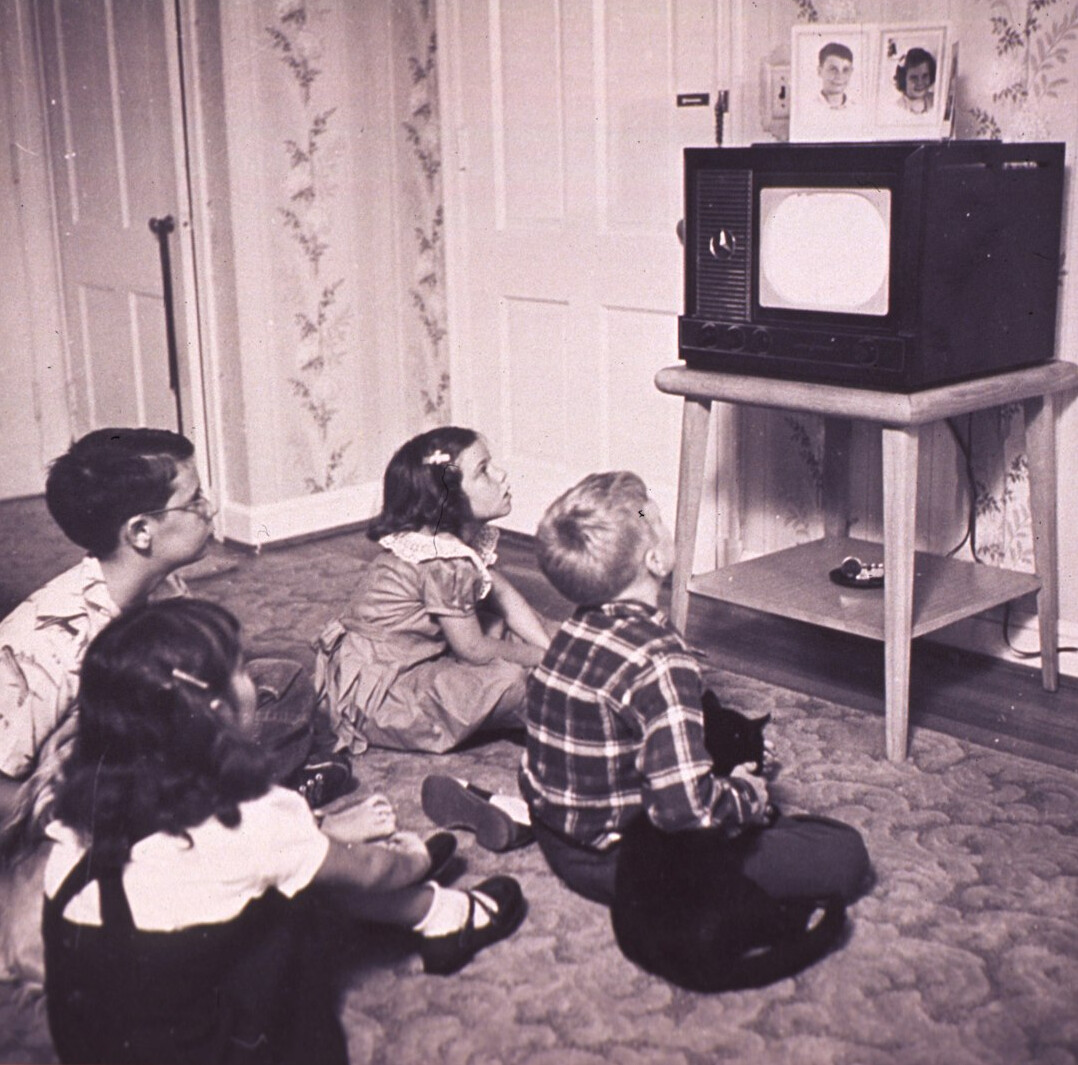 family watching television